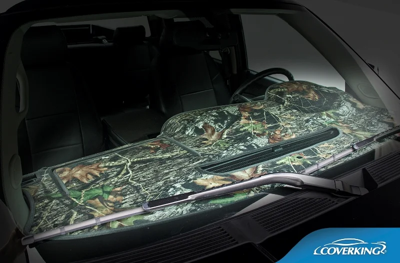 https://www.carcoverusa.com/images/coverking/coverking-camo-dashboard-cover-2.webp